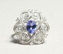 A GOOD 18CT WHITE GOLD, DIAMOND AND SAPPHIRE RING