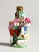 A SMALL SAMSON OF PARIS PORCELAIN SCENT BOTTLE, young lovers and a lamb. 2.5ins high.