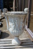 A VERY GOOD, PAIR OF ITALIAN CARVED, WHITE MARBLE TWO HANDLED URNS, the sides carved with cupids 4ft