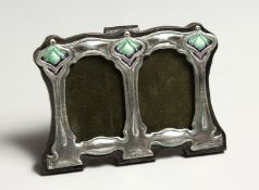 A SMALL SILVER DOUBLE PHOTOGRAPH FRAME 3ins x 4ins