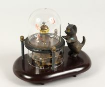 A MECHANICAL CAT AND DOG CLOCK 6ins high