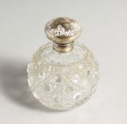 A VICTORIAN CUT GLASS SCENT BOTTLE with silver top. Birmingham 1896