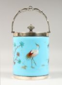 A VICTORIAN BLUE GLASS CIRCULAR OPALINE BISCUIT BARREL painted with birds and bamboo with plated