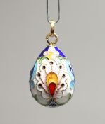 A RUSSIAN SILVER AND ENAMEL EGG PENDANT