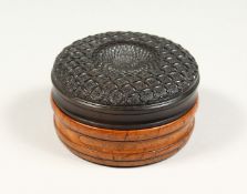 A GOOD 19TH CENTURY TORTOISESHELL AND WOOD CIRCULAR BOX. 3.5ins diameter