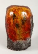A LARGE AMBER SCULPTURE 8ins
