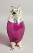 A LARGE PLATED CRANBERRY OWL CLARET JUG with glass eyes 11.5ins high.