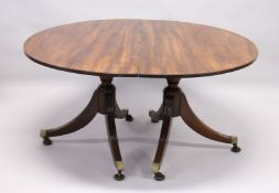 A GOOD GEORGIAN DESIGN MAHOGANY DOUBLE PILLAR DINING TABLE with loose leaf, on quadruple curving