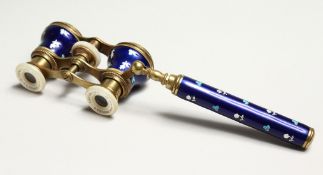 A VERY GOOD SET OF ENAMEL AND MOTHER OF PEARL OPERA GLASSES with handles. Comptoir Central,