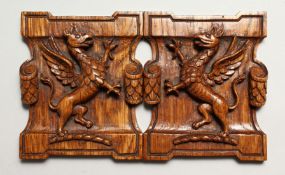 A PAIR OF TREEN CARVED DRAGON PLAQUES 5ins x 4ins