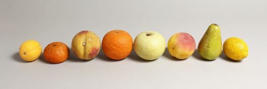 EIGHT PIECES OF REALISTIC CARVED AND PAINTED ALABASTER FRUIT.