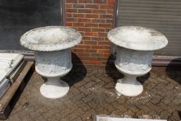 A VERY GOOD PAIR OF ITALIAN CARVED WHITE MARBLE TWO HANDLED URNS, the sides carved with figures