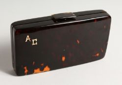 A TORTIOSESHELL VANITY CASE with gold initials ‘A. C.’