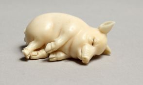 AN IVORY LUCKY PIG, GARRET & SONS, PICCADILLY. 1ins.