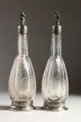 A VERY GOOD PAIR OF EUROPEAN SILVER MOUNTED, ETCHED GLASS, RECTANGULAR WINE BOTTLES, the glass