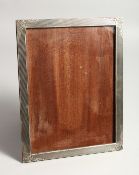 AN ENGINE TURNED SILVER PHOTOGRAPH FRAME 10.5ins x 8ins