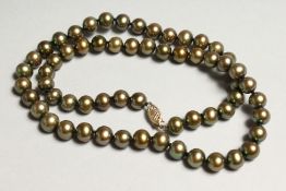 A SET OF GREEN PEARLS