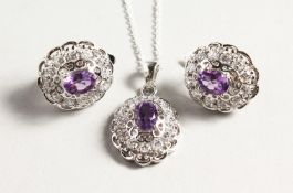 A SILVER AMETHYST NECKLACE AND EARRINGS