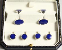 A STERLING SILVER AND LAPIS DRESS SET, comprising a pair of cuff links and four studs.