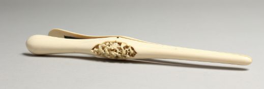 A PAIR OF CARVED IVORY GLOVE STRETCHERS 10ins long