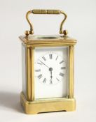 A 19TH CENTURY FRENCH BRASS CARRIAGE CLOCK 3ins high
