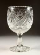 A SLICE CUT GOBLET SHAPED VASE 9ins high.