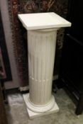 A CARVED AND PAINTED WOOD DORIC COLUMN 42ins high x 14ins wide.