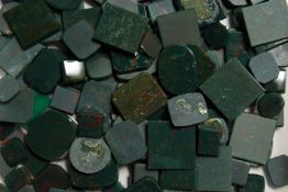 A BOX OF BLOODSTONE STONES