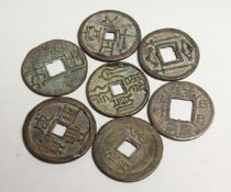 A BAG OF SEVEN CHINESE COINS