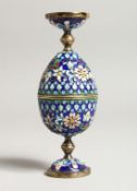 A PAIR OF RUSSIAN SILVER AND ENAMEL DOUBLE EGG CUPS Maker M C