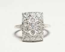 AN 18 CT. WHITE GOLD AND DIAMOND ART DECO STYLE RING Size O.