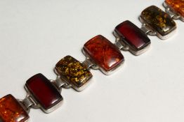 A SILVER AND AMBER BRACELET