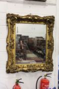 A LARGE AND IMPRESSIVE 19TH CENTURY GILT FRAMED MIRROR
