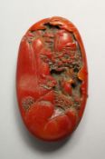 A CHINESE CARVED OVAL STONE PEBBLE 3.75ins long
