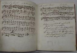 MUSIC SONGBOOK, an early 19th c. sm. 4to oblong musical manuscript with lyrics where appropriate,