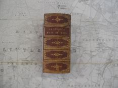 [KENT] a leather gilt book box (lacking lid) housing 