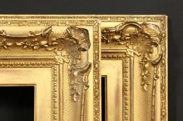 A pair of 19th century gilt composition swept frames, rebate size each 10 x 20 , 25.5cm x 51cm.