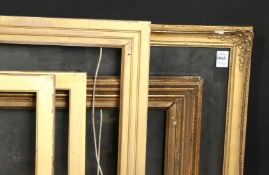 A 19th century watercolour frame, a later gilt composition frame and three gold leaf slips,