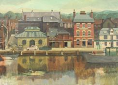 Brenda Johnston (b. 1930) British, Buildings on the quay side with moored boats, oil on canvas,