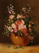 Coranza, a still life of flowers in a jug, signed, oil on panel, 9.5 x 7.5 .