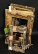 A group of eight smaller gilt composition frames and slips, various sizes.