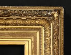 A 19th century continental gilt composition frame, rebate size 9 x 11.5 , 23cm x 29cm (wide