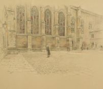 Cecil Aldin (1870-1935) A gentleman in a courtyard before an ecclesiastical building exterior,