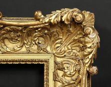 A 19th century carved wood frame with locking inner front ornament, rebate size 12 x 16 , 31cm x