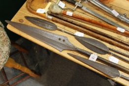 A large steel headed spear together with two Assegai spears and another spear head.
