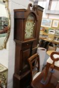 A 19th century mahogany long case clock with painted arched dial.