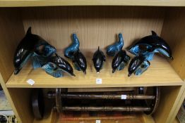 Poole Pottery dolphins and sealions.