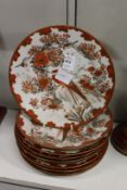 A set of ten Japanese Kutani porcelain plates.