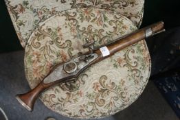 A reproduction wheel lock pistol.