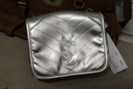 A ladies' silver handbag.